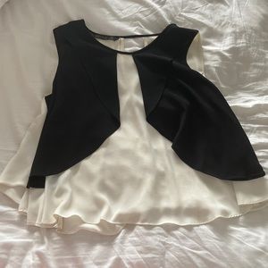 Flowy black and white sleeveless blouse from Zara Basics